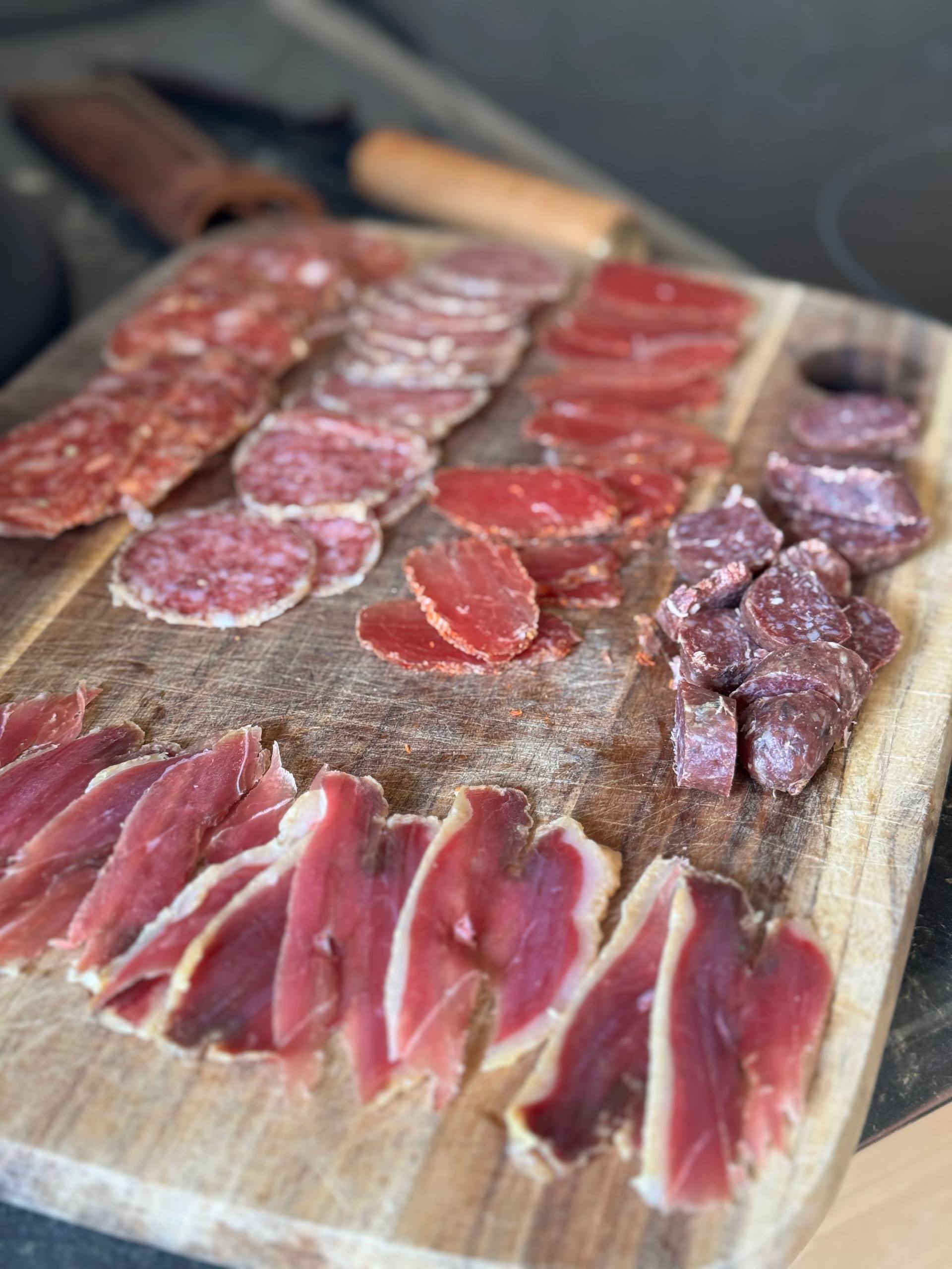 Charcuterie board with homemade charcuterie.